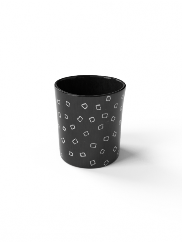 Beaker with square sgraffito patterns made with black porcelain