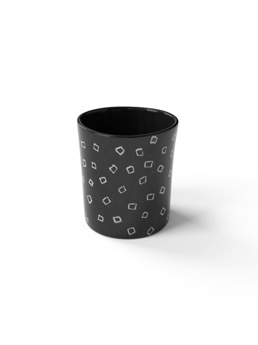 Beaker with square sgraffito patterns made with black porcelain